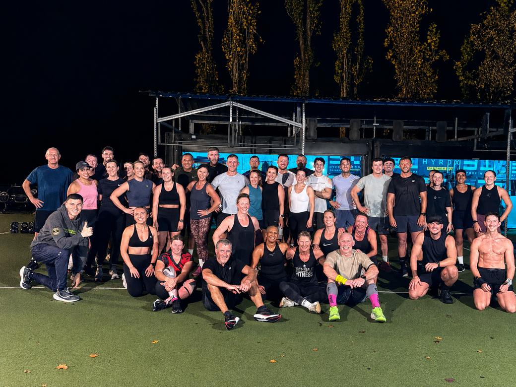 The full BODY HEALTH FITNESS community after an evening session at the HYROX partner gym