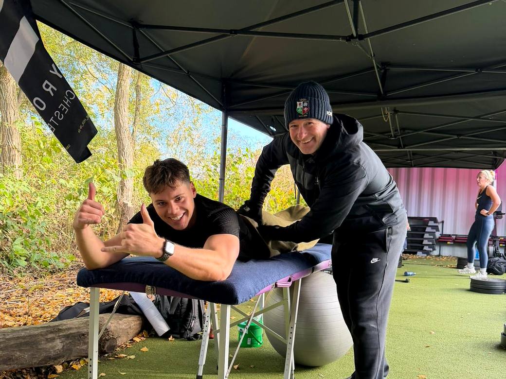 Post-session sports massage at a BODY HEALTH FITNESS outdoor session